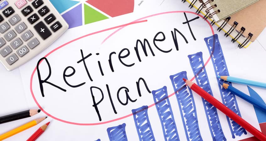 Detailed image of retirement planning with bar graph and pens, symbolising senior citizens' financial security.