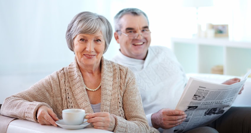 Elderly people enjoying a social moment at the Irish Senior Citizens Parliament.