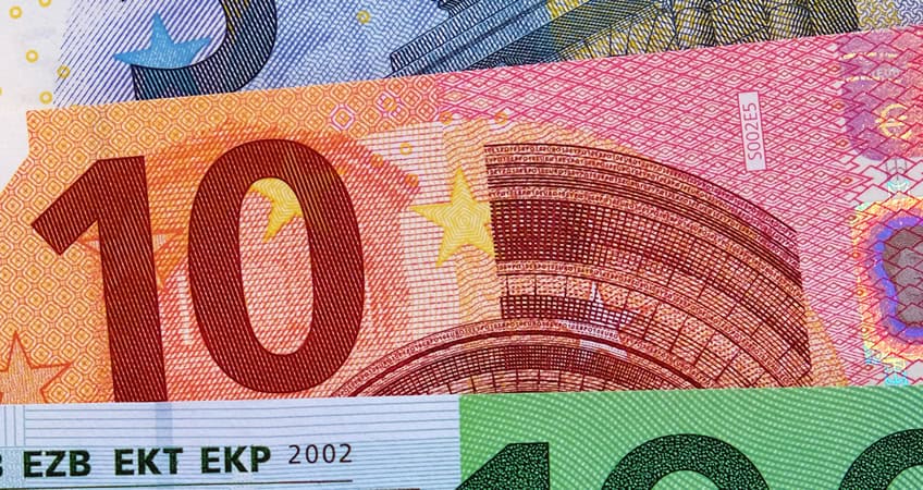 Banknotes showing currency, symbolising financial security for seniors.