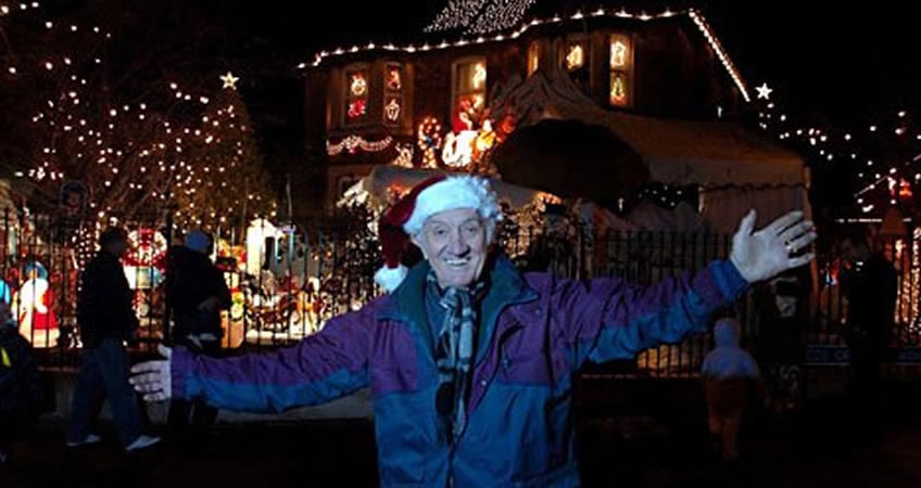 Festive senior citizens enjoying parade and holiday lights at Irish Senior Citizens Parliament.