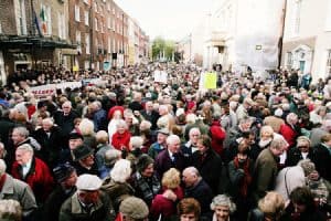 Crowd of senior citizens protesting for senior rights in Dublin.