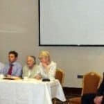Senior citizens at Irish Senior Citizens Parliament event, engaging in discussions on aging and community issues.