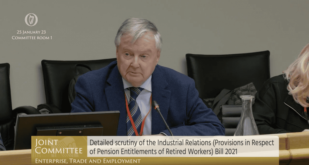 Senior citizens discussing pension entitlements and policies at Irish Senior Citizens Parliament.