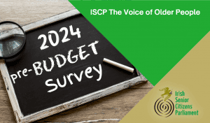 Image shows a blackboard with “2024 Pre-Budget Survey” written on it, with a magnifying glass and chalk, promoting Irish Senior Citizens Parliament.