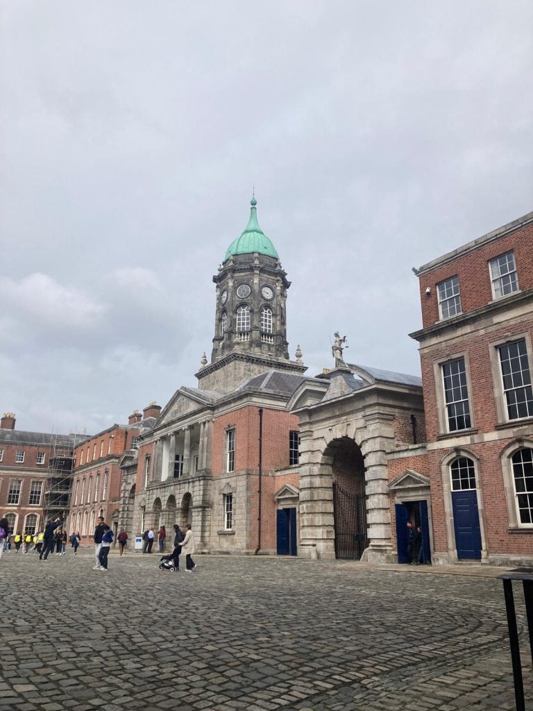 Historic Irish courthouse with clock tower hosting senior citizens' advocacy event.